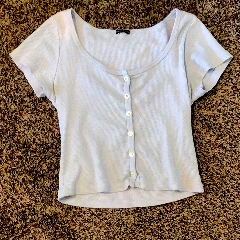 I am selling this blue cropped shirt from Brandy Melville.